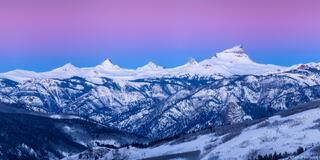 vibrant sky and snow blanketed peaks